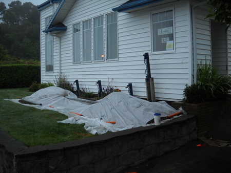 Neat job site soil covered, rain coming